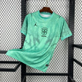 Maillot Brésil vert menthe à motifs noirs, vue de face