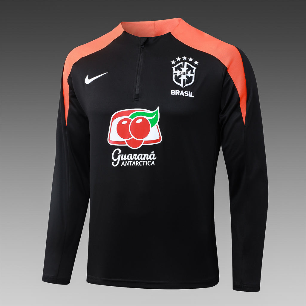 Pull du Brésil noir avec empiècements corail, manches longues et col demi-zip